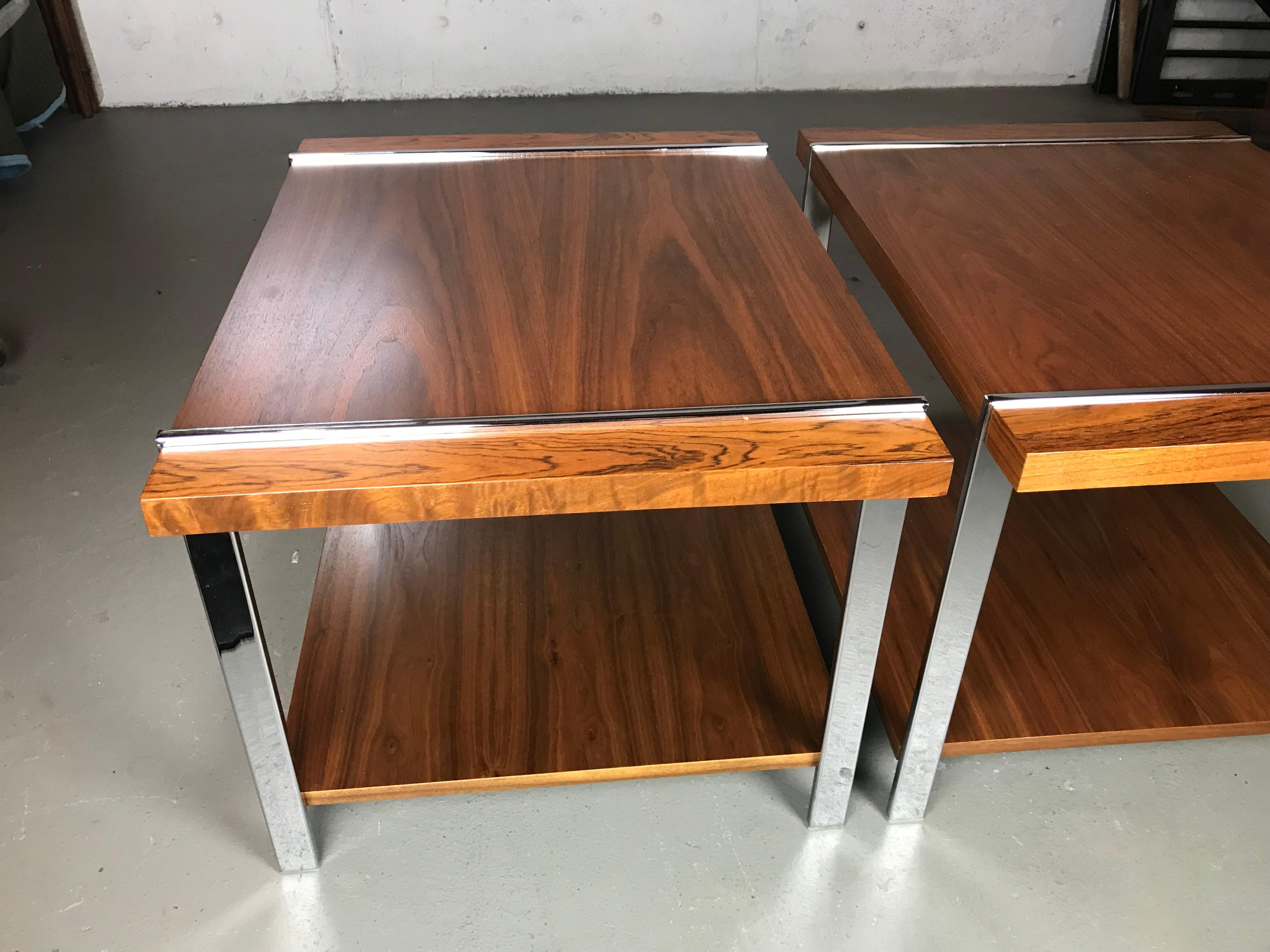 Very nice pair of Mid-Century Modern end tables by Milo Baughman for Lane. Made of rosewood, walnut & chrome. The tables have been refinished. Very light signs of use on the chrome. Nice chrome frames that show the wood planks jutting through.
