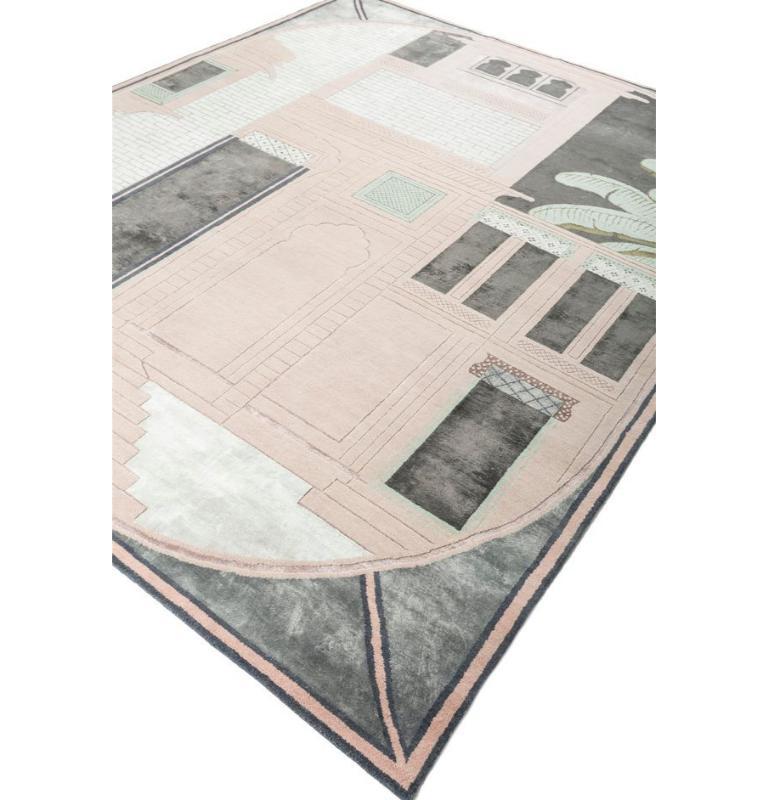 ¿Puede una alfombra captar la esencia del alma de una ciudad? Desde luego que sí, con la Colección Jaipur Wunderkammer de Matteo Cibic. Tejida a mano con esmero, esta alfombra artesanal rinde homenaje a la vibrante arquitectura y los tonos de