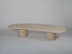 Architectural organic shape travertine coffee table