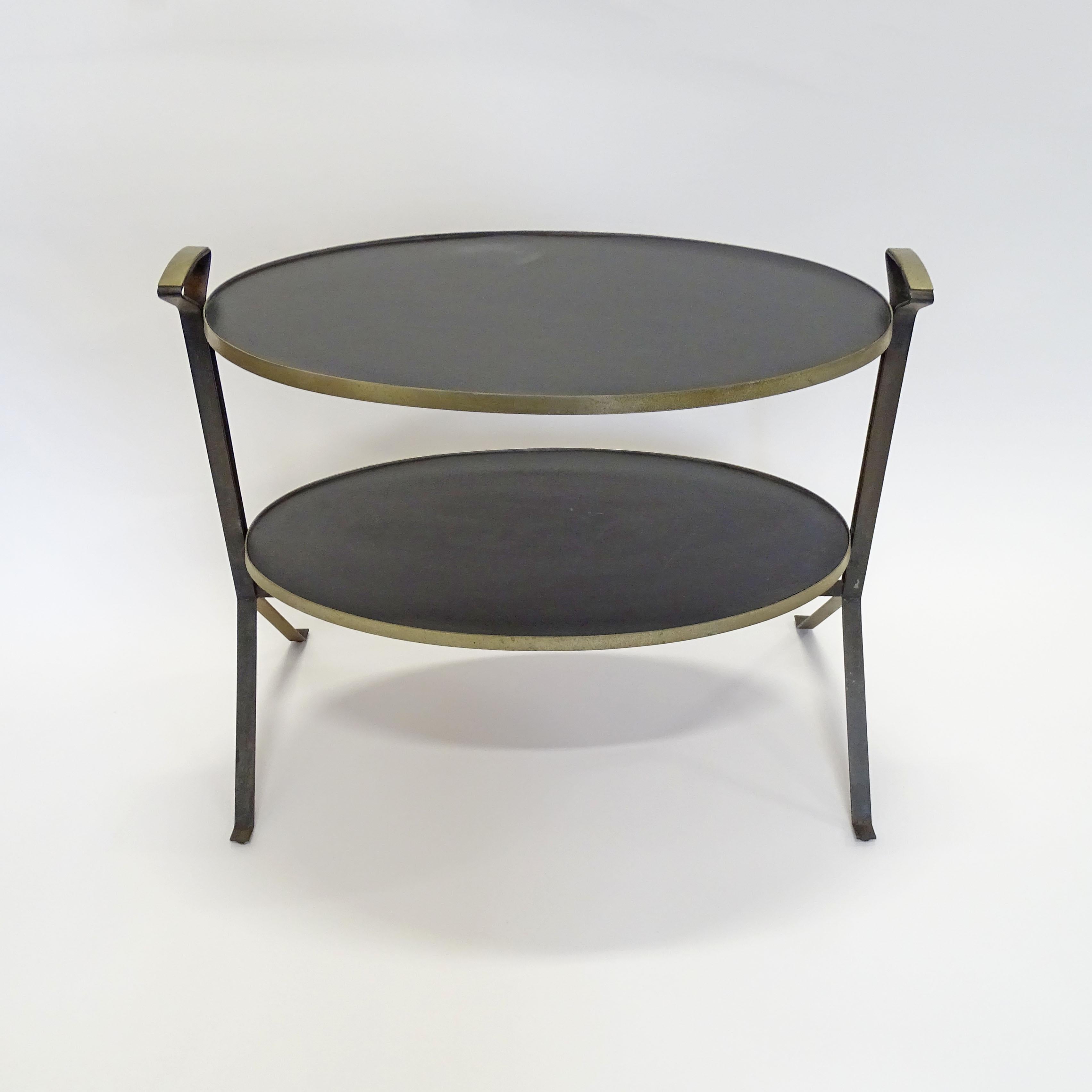 Architectural oval two tier serving table with handles, Italy, 1950s.