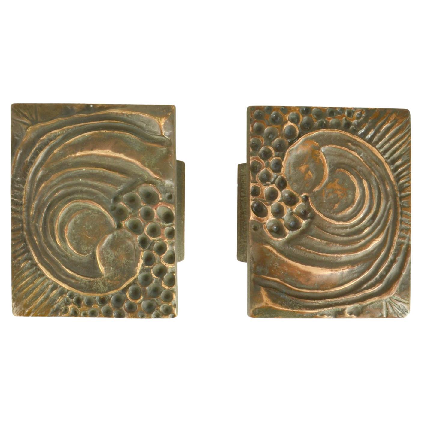 Coppia di maniglie quadrate in bronzo per porte a pressione e a tirare con rilievo organico