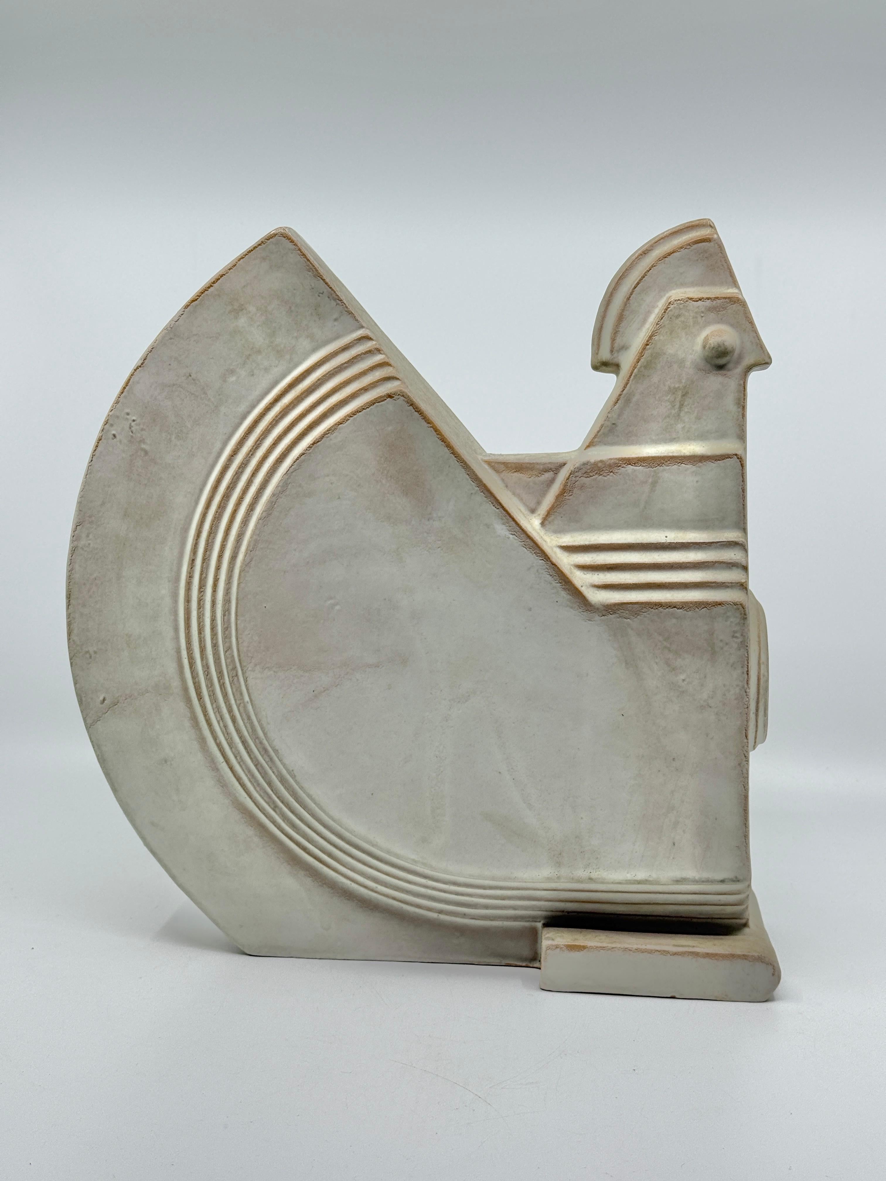 A wonderful piece of architectural pottery in the form of a rooster. Art deco influences for certain although we’re uncertain  as to maker, age or origin. In generally good condition with some glaze losses, age accumulated surface grime and some old