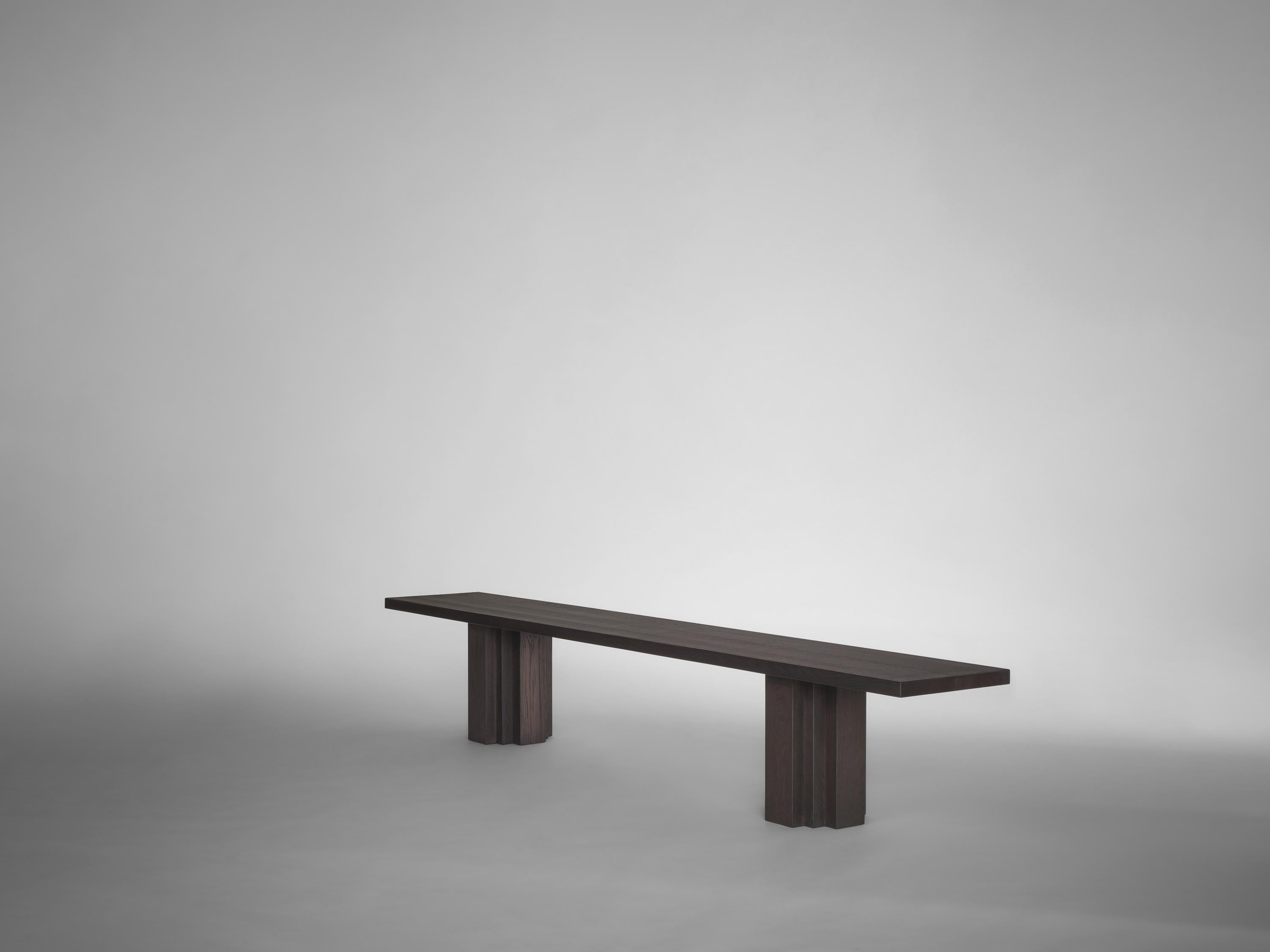 The Brut collection takes cues from Brutalism and Amsterdam School architecture. A balance of raw materiality and subdued forms with geometrically expressive detailing. The Brut bench functions as seating matching the Brut table or as an individual