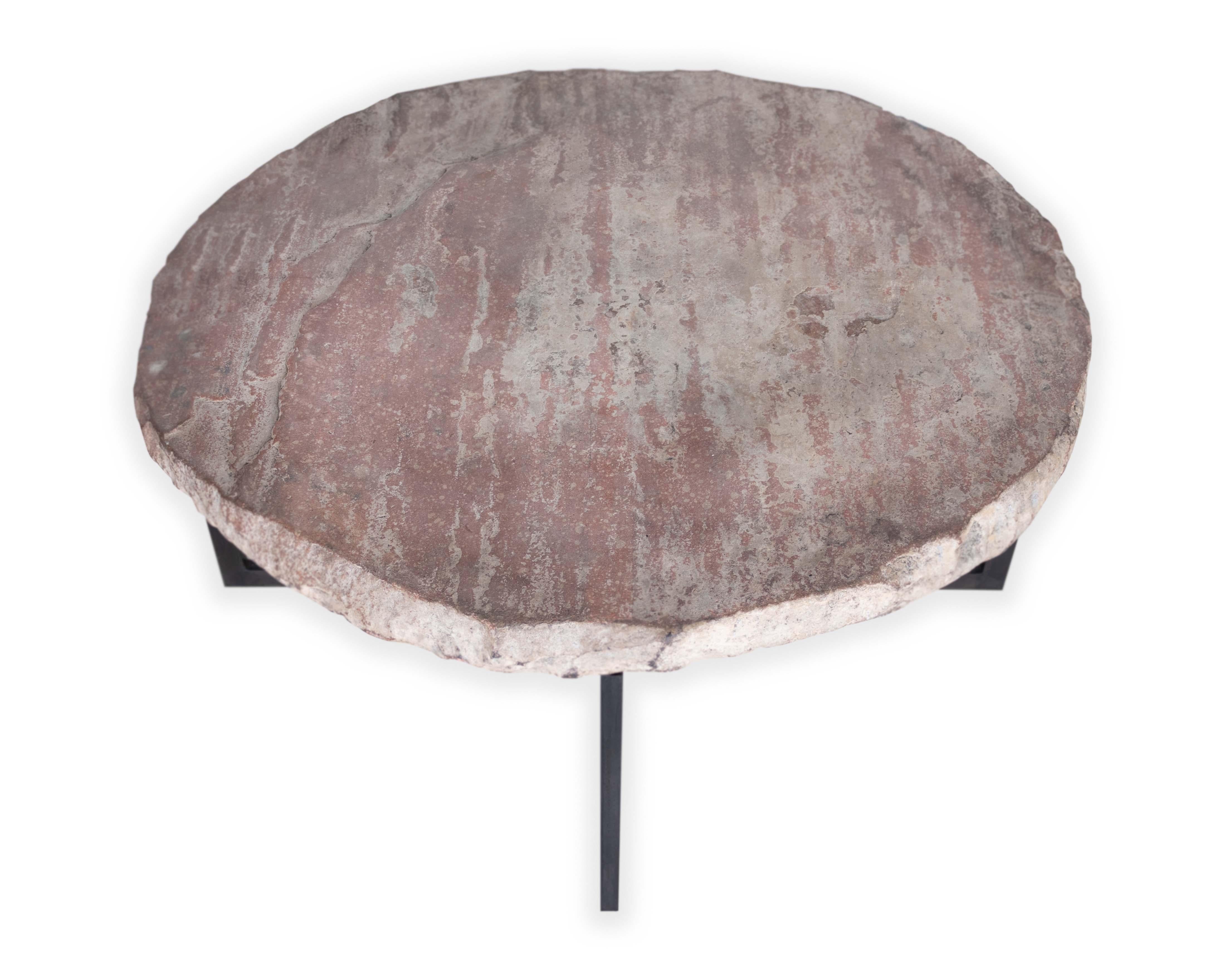 Architectural stone element on steel base coffee table. 

This piece is a part of Brendan Bass’s one-of-a-kind collection, Le Monde. French for “The World”, the Le Monde collection is made up of rare and hard to find pieces curated by Brendan from