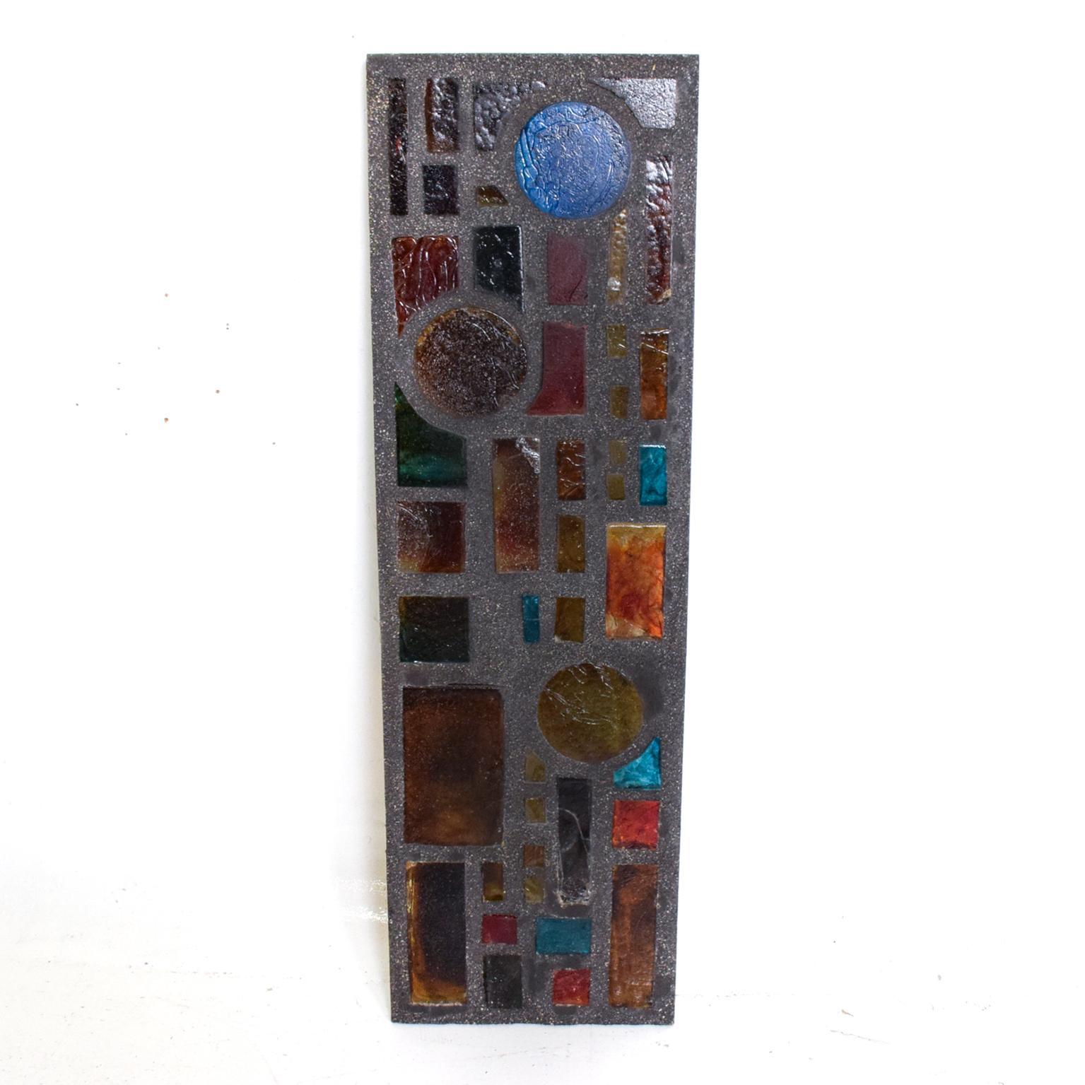 For your consideration, a beautiful Architectural Wall Art Colored Glass Panel.

Custom made.

One side has a smooth finish. The other has more texture.

Constructed with colored glass blocks and concrete. 

DImensions: 46 1/2