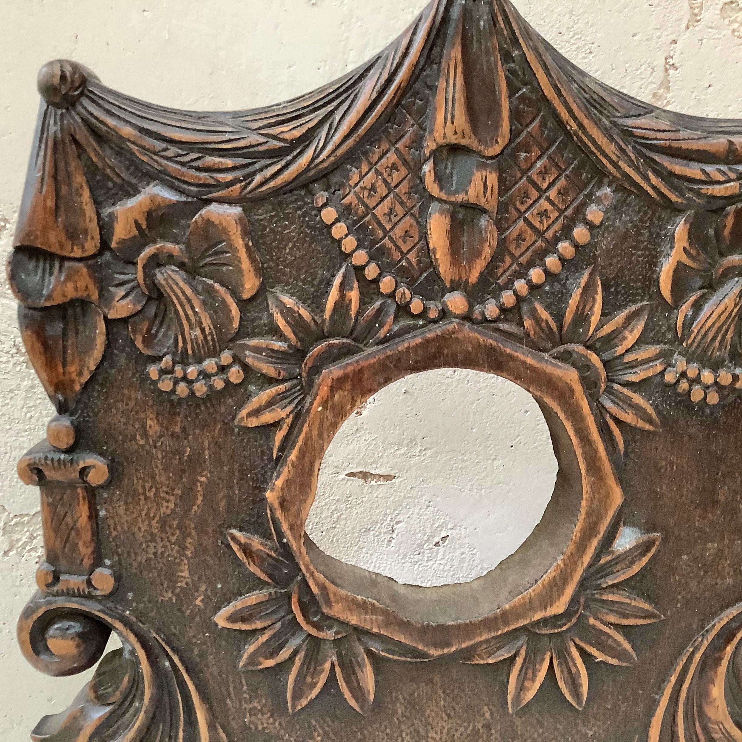 Antique architectural oakwood element nicely carved with leaves on wood pedestal, circa 1890.