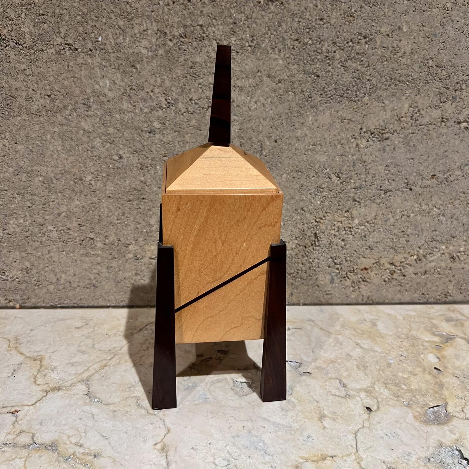 AMBIANIC presents
Modernist Tiered Wood Sculptural Jewelry Box
Dome Steeple top and pull-out drawers
9.5 h x 4 x 4
Preowned vintage condition
See all images for details