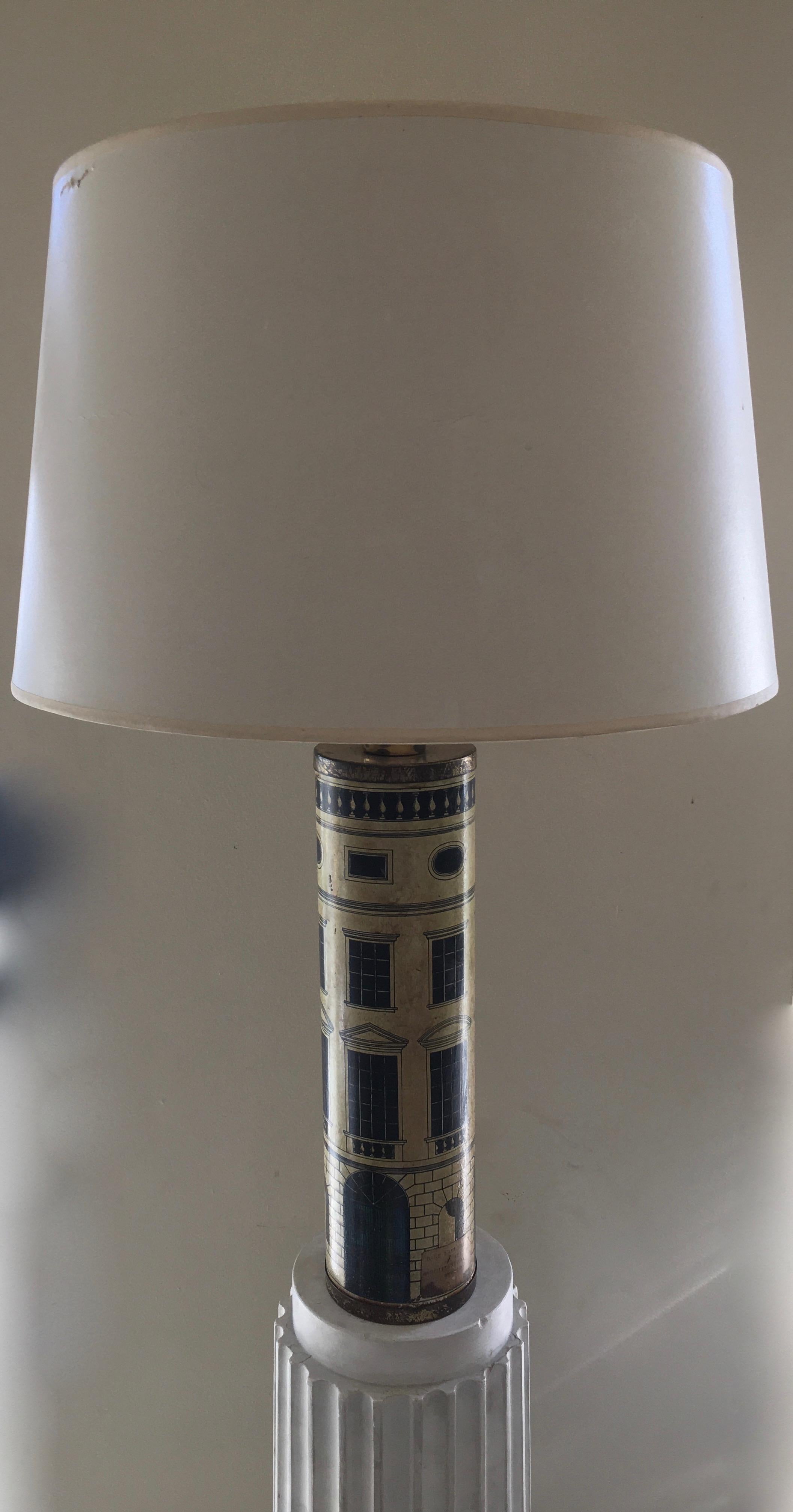 This iconic lamp is coming from P. Fornasetti workshop in Milan.
Labeled 