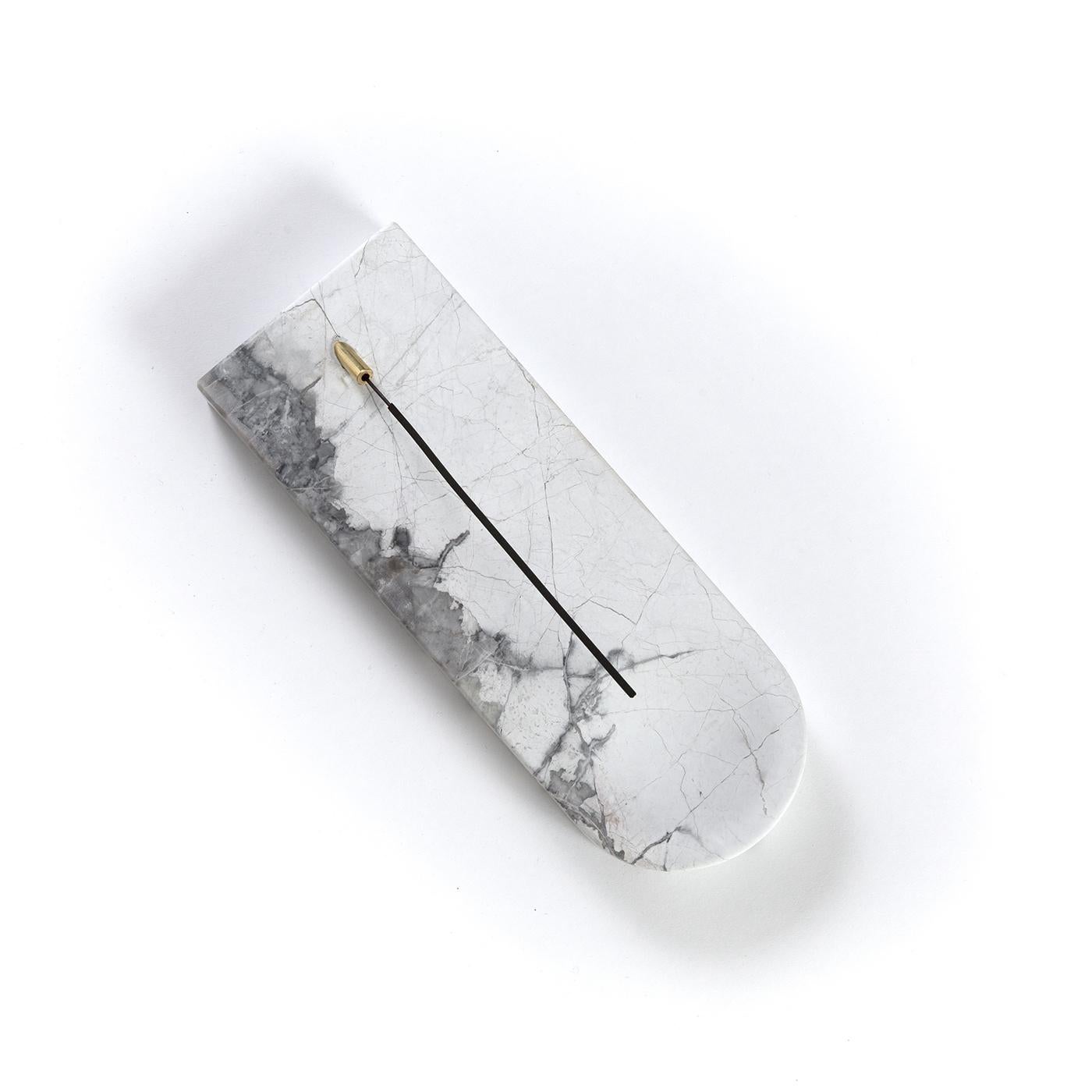 Inspired by the metaphysical architecture of De Chirico's paintings, this elegant incense holder is a stunning sculptural piece. It is crafted of polished Invisible Gray marble, whose natural veins add a one-of-a-kind decoration to the linear