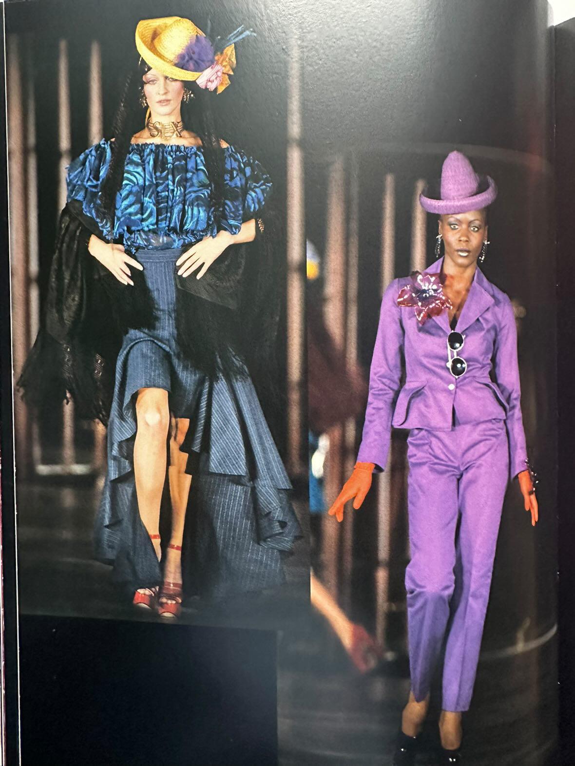 An important, well-documented and highly coveted Vivienne Westwood black pinstripe light weight wool two-piece ensemble dating back to her iconic 1994 'Café Society' spring-summer collection. As shown Susie Cave walked the runway in this sensational