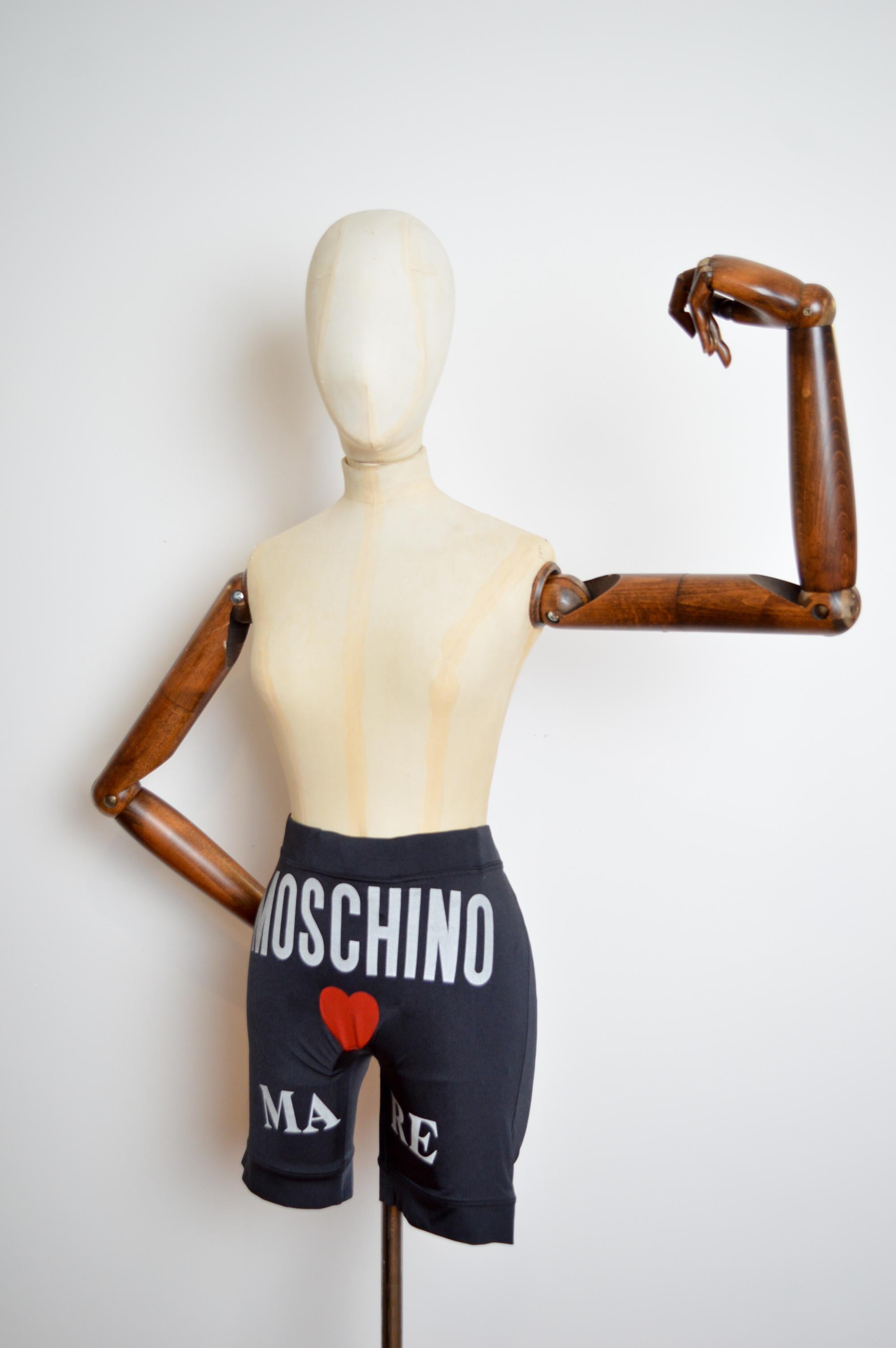 Unisex Loud Moschino 1990's Black Novelty Heart on the Crotch Nylon stretchy cycling Shorts 
MADE IN ITALY !
Adjustable draw tie waist.
80% Polyamide 20% Elasthane 
Waist line (hip) ; upto 34”
Leg; 8”
Size; Label : Medium (we recommend