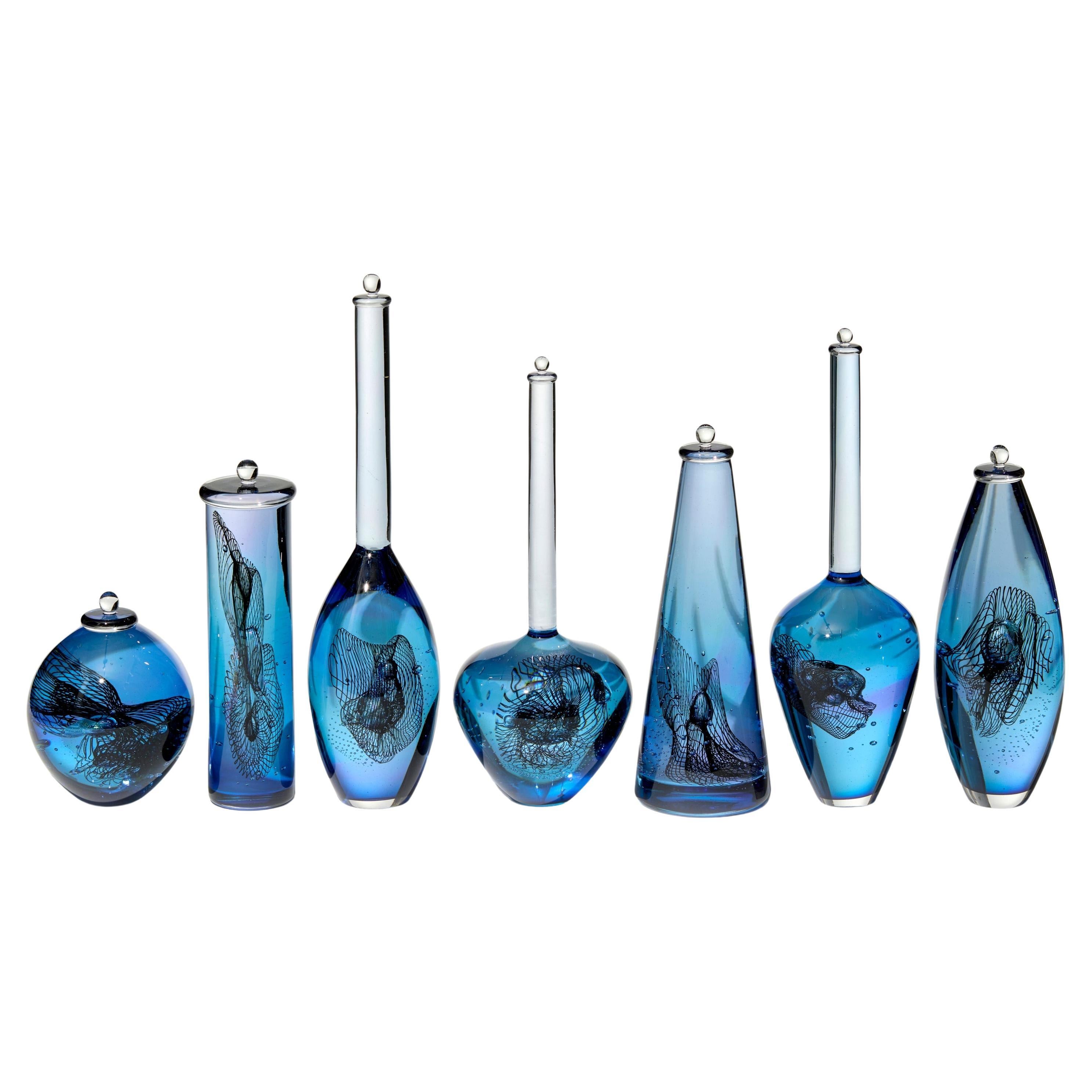 Archive of Unknown Dark Materials, a blue glass installation by Louis Thompson