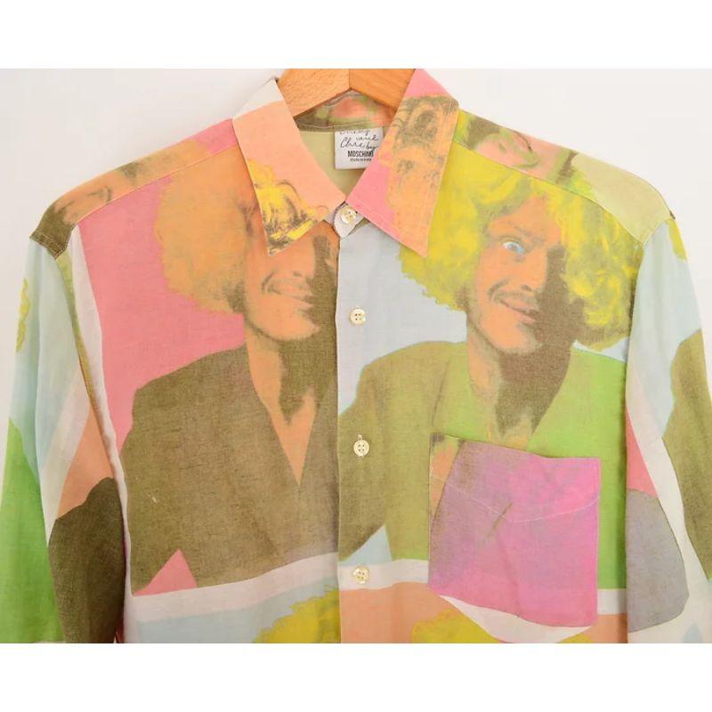Superb Vintage 1990's Moschino shirt inspired by the works of Andy Warhol, crafted from linen in pastel coloured shades depicting the faces of Franco Moschino. 

MADE IN ITALY !

Features: 
Cheap & Chic Label
Central line button fasten
Iconic