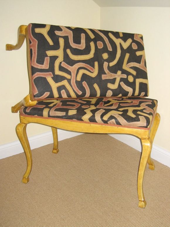 A pair of painted benches from Torino, Italy upholstered with African Kuba cloth from the 1920's.  Great color, great form.
