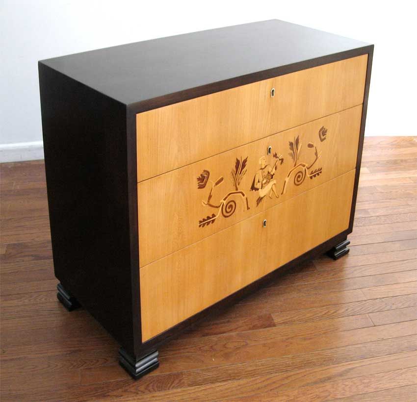 Charming Swedish modernist 3-drawer chest made from stained solid birch with exotic wood marquetry. Great as a night stand. Made in the 1930's. H. 29