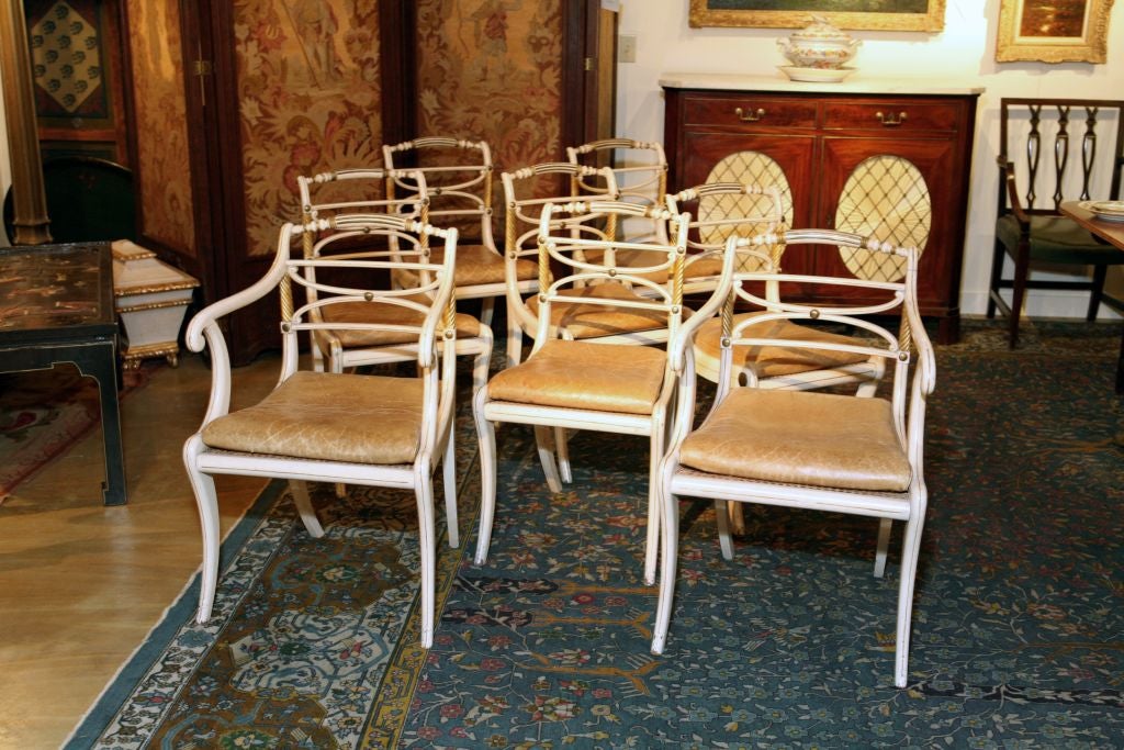 A Fine Set of Eight Regency Lacquered & Parcelgilt Dining Chairs