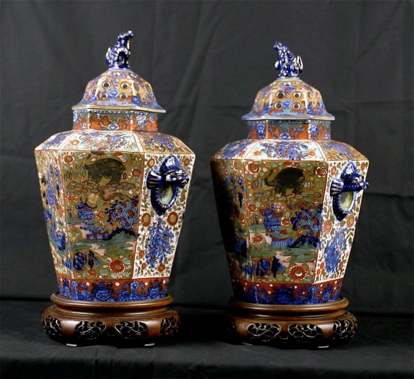 A pair of English porcelain (Possibly Coalport) pot-pourri urns, the three-piece bodies originally decorated in blue and white, later in the 
