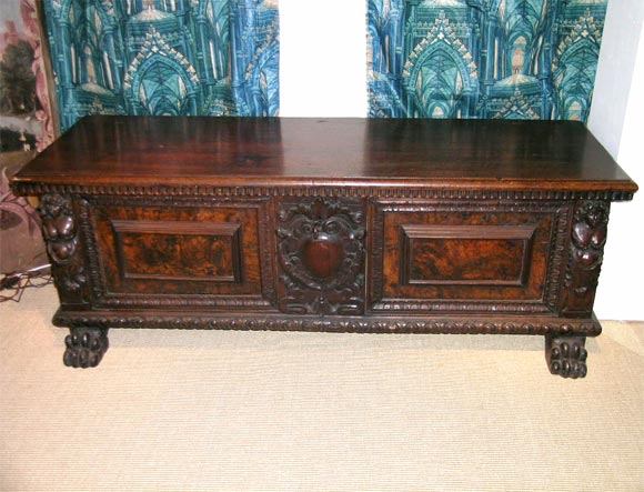 Hand carved walnut cassone, Italy 17th century with wrought iron handles.