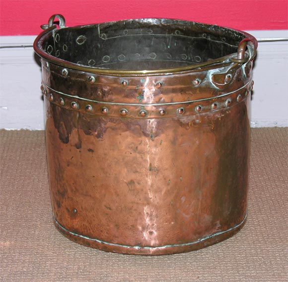 Lovely copper English apple kettle with bail handle and stud rivetted construction and design. Great for kindling.