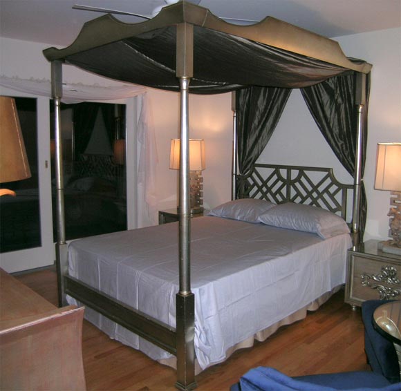 This glamorous four poster canopy bed was featured in the 2005 Hamptons Design House.  The stylish wood frame has elegant lines which are complimented by the alluring silver finish.   The frame fits a tradtional Queen size mattress. (Hangings and