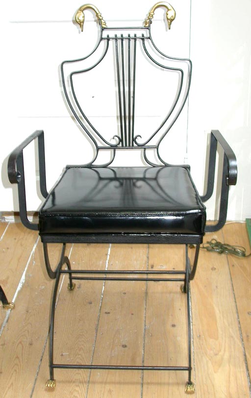 Pair of Iron Swan Head Arm Chairs
