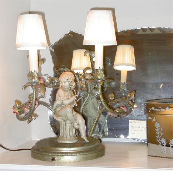 Pair of unusual Putti figural lamps