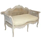 Antique French settee with double caning