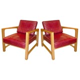 Pair of open-arm mahogany lounge chairs by Harvey Probber