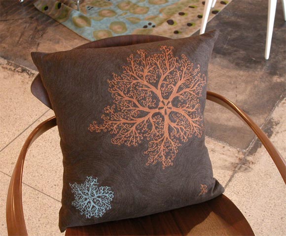 This is one example of many designs by Federica Tondato.  The designs are availabe as pillows and rugs.  Please inquire at Emmerson Troop for ordering information and additional patterns.
