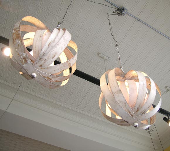 Pair of adjustable steel band globe fixtures. designed and produced by verner panton.  great rusted surface