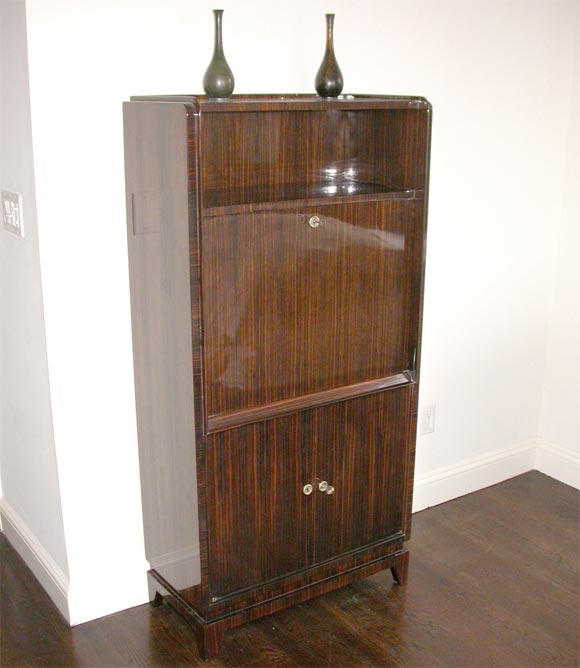 Clean line example. Macassar ebony veneer. Sycamore interior. Brushed steel details.