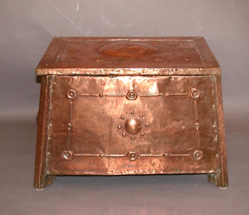 An English Arts and Crafts period hammered copper coal bin of trapezoidal form.