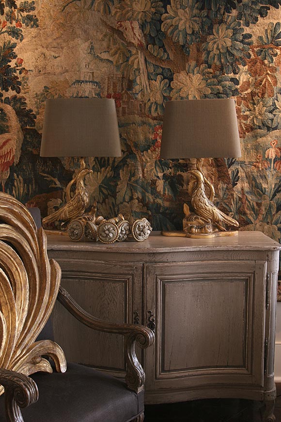 Graceful and unusual gilded fragments complimented by shades in medium taupe Belgian linen shade with gold lining.