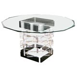 Lucite table base with glass top.