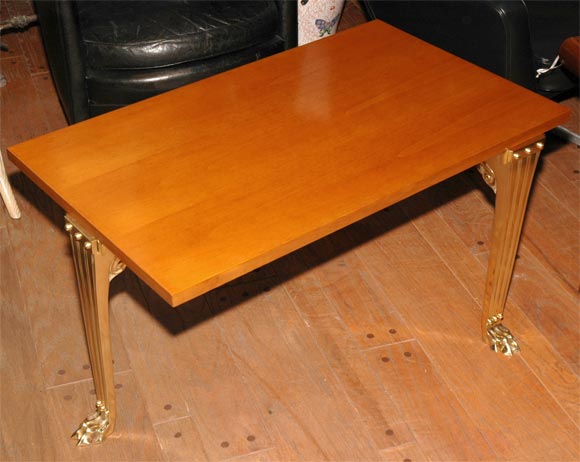 Robsjohn Gibbings by Saridis table #10 with greek walnut top and 3 bronze legs joined by stretchers