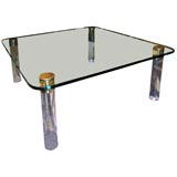 Glass topped lucite coffee table by Karl Springer