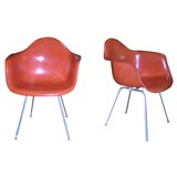 Set of six Eames molded fiberglass armchairs
