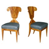 Eight Biedermeier style dining chairs.