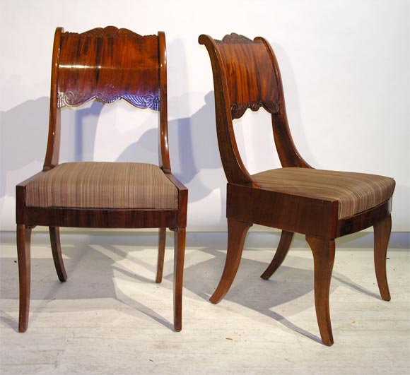Set of eight Russian mahogany Neoclassic chairs with klismo legs