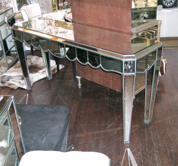 scalloped mirrored console table