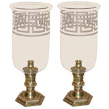 pair of large glass shades with greek key etchings on stands pair of large glass shades with greek key etchings on stands