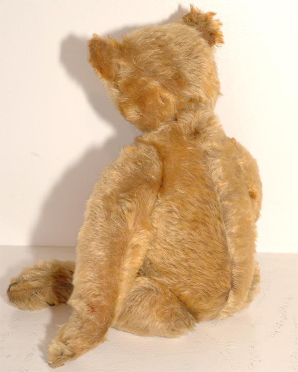 1907 STEIFF BEAR IN ALL ORIGINAL CONDITION-COVERED IN ORIGINAL MOHAIR AND STAW STUFFED AND SHOE BUTTON EYES WITH SLIGHT WEAR TO THE PATS (HANDS AND FEET) GREAT ADDITION TO ANY BEAR OR TOY COLLECTION