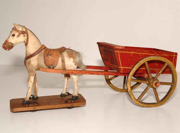 19THC ORIGINAL PAINTED WAGON WITH PONY SKIN COVERED HORSE ON CAST IRON WHEELS PULLING THE ORIGINAL RED AND YELLOW PAINTED WAGON-THE HORSE ALSO HAS THE ORIGINAL LEATHER SADDLE AND HAND SEWN PONY SKIN -ALL ORIGINAL