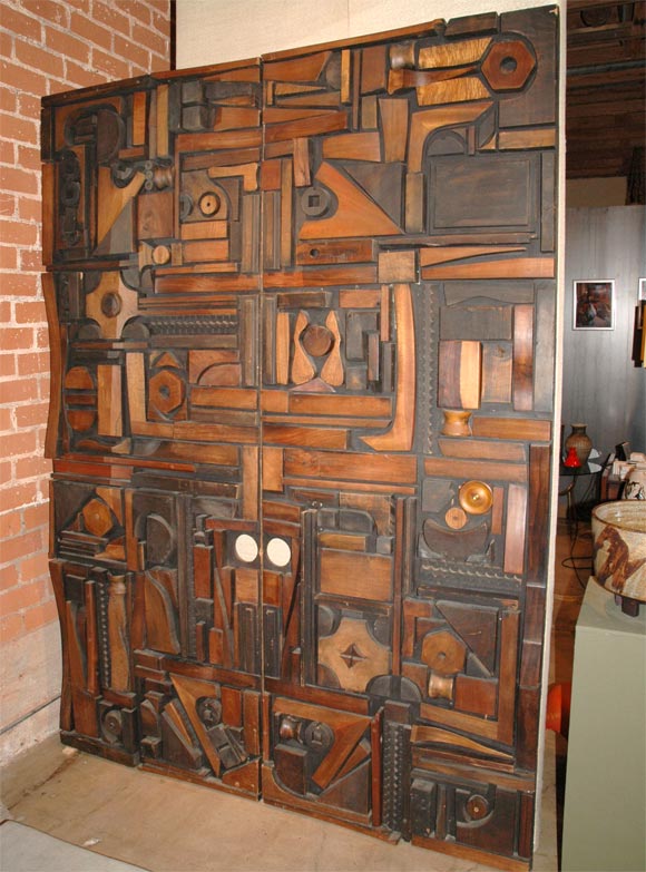 Pair of sculptured panel doors in assorted tumbled woods. Door panels are large in scale and can be easily mounted and used  as wall art as well as doors. Designed and crafted by Mabel Hutchinson.