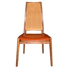 Custom walnut & cane back chair by John Kapel