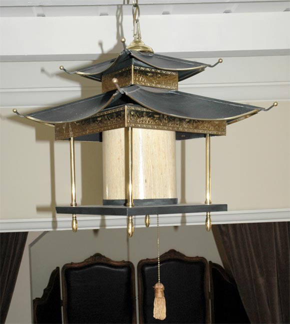Pair of rare vintage Chinese pagoda style lanterns. Lanterns can be used as swag sconces or chandeliers.  Fabulous!