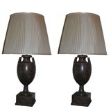 A pair of urn shaped lamps