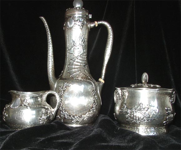 Sterling silver demitasse coffee set in Tiffany's highly desirable Japanese style, with a marine theme. Islamic coffee pot (approx. 8 1/2