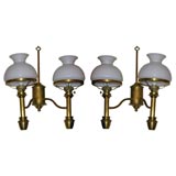 Set of six brass two-arm sconces