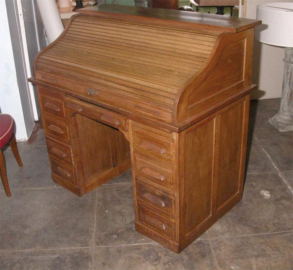 Oak Roll Top Desk with locking mechanism which lock all drawers when top is closed.  Locking Top.